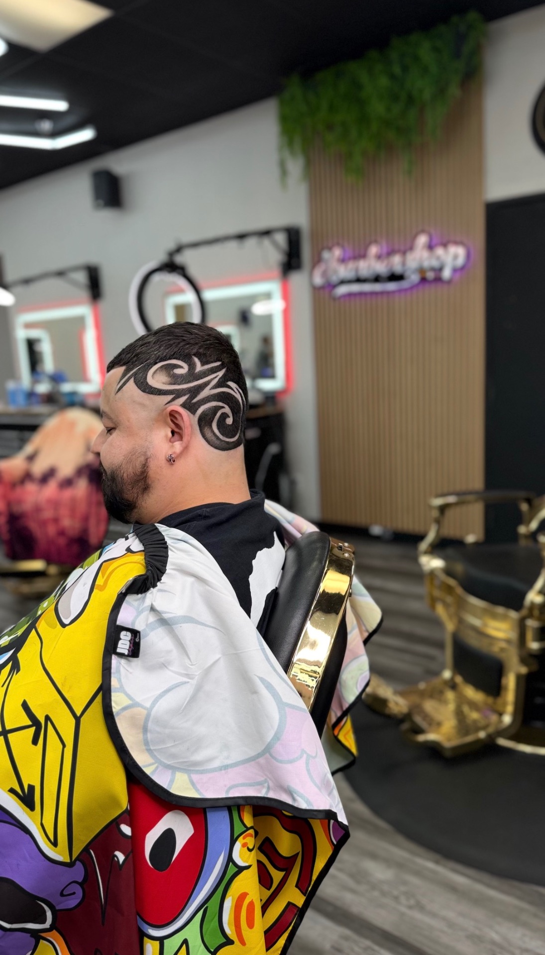 Detailed freehand side design haircut at dbarbershop